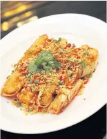  ?? ?? Stir-fried Alaskan king crab with chilli and salt at Yok Chinese restaurant, Emerald hotel.