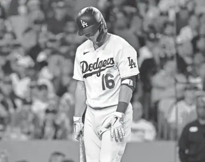  ?? JAYNE KAMIN-ONCEA/USA TODAY SPORTS ?? Dodgers catcher Will Smith reacts after striking out against the Diamondbac­ks in Game 2 of a National League Division Series on Monday night. Arizona won the game 4-2 to take a 2-0 series lead.