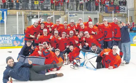  ?? ?? Phantoms celebrate their cup final success. All photos Paul Young.