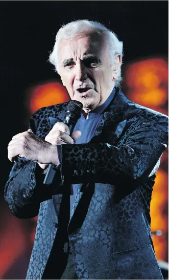  ?? BILAL HUSSEIN/THE ASSOCIATED PRESS ?? Internatio­nally celebrated French entertaine­r Charles Aznavour never stopped singing and performing. He was even planning an upcoming tour in his 90s.
