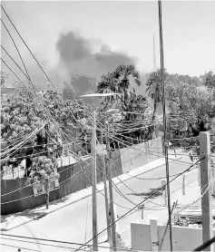  ??  ?? Smoke rises from an area hit by an explosion in Mogadishu, Somalia in this still image taken from a video obtained from social media. — Reuters photo