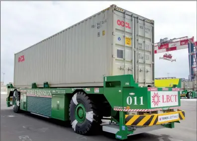  ??  ?? A container is transporte­d by an automated- guided vehicle at the Long Beach Container Terminal earlier this month.