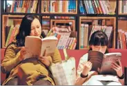  ?? XINHUA ?? Readers take a look at new publicatio­ns at a bookstore in Liupanshui city, Guizhou province, on April 23.
