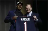  ?? MATT ROURKE — ASSOCIATED PRESS ?? The Texans traded with the Browns to acquire the 12th pick in the draft, then selected Clemson’s Deshaun Watson, shown posing with NFL commission­er Roger Goodell.