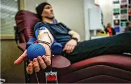  ?? JIM NOELKER / STAFF ?? Todd Geglein from Dayton donates whole blood at the Dayton Blood Center on Tuesday. The Dayton region is in critical need of certain blood types.