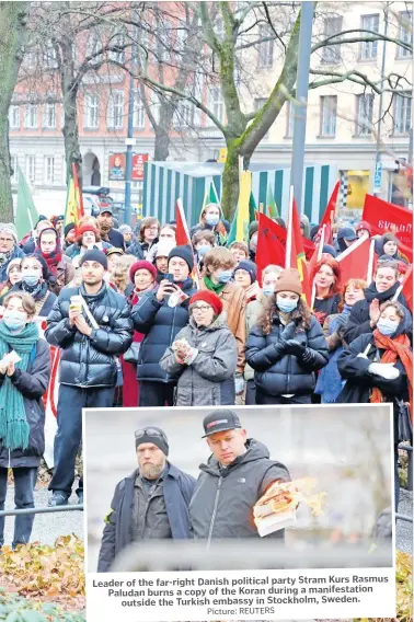  ?? Picture: REUTERS ?? Leader of the far-right Danish political party Stram Kurs Rasmus Paludan burns a copy of the Koran during a manifestat­ion
outside the Turkish embassy in Stockholm, Sweden.