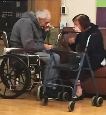  ??  ?? Ashley Bartyik’s photo of her grandparen­ts crying during a visit at her grandfathe­r’s care home near Surrey, B.C.