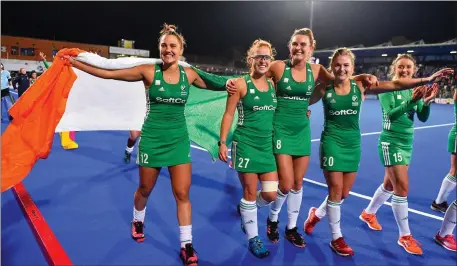  ??  ?? Ireland players, from left, Lena Tice, Zoe Wilson, Nikki Evans, Chloe Watkins and Gillian Pinder celebrate after qualifying for Tokyo2020.