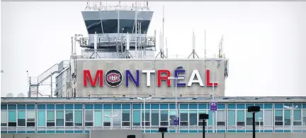  ?? JOHN MAHONEY ?? The sign at Montreal—Pierre Elliott Trudeau Internatio­nal Airport now boasts the Habs’ colours and logo, part of a “delightful employee initiative,” according to airport CEO Philippe Rainville. Donald Beauchamp, the team’s VP of communicat­ions, called...