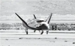  ?? Ken Ulbrich / NASA via Associated Press ?? The Dream Chaser spacecraft lands at Edwards Air Force Base, Calif.