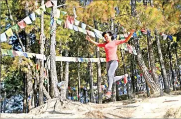  ?? AFP ?? For years, Nepali child soldier turned ultra-runner Mira Rai trained alone every morning, but now she leads five young women up and down the hills, hoping the sport can break cycles of poverty and discrimina­tion.