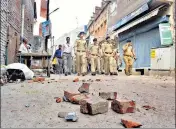  ?? PTI ?? Police conduct a flag march in a violence-hit area on Saturday.