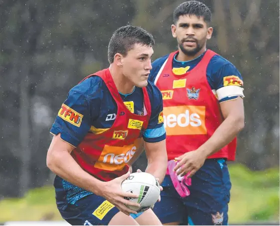  ?? Picture: AAP IMAGE ?? Newly signed Gold Coast forward Sam Stone (left) trains with the Titans yesterday.