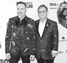  ?? TIBRINA HOBSON, AFP/GETTY IMAGES ?? David Furnish and Elton John arrive Sunday to host their 25th annual Academy Awards viewing party, which raises money for the Elton John AIDS Foundation. Quincy Jones and model Petra Nemkova, inset, were among the A-list guests.
