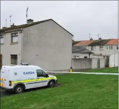  ??  ?? Gardai at the scene of the petrol bombing in Muirhevnam­or.