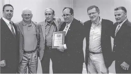  ??  ?? Harness racing greats attended as Gerry Nelson was inducted into the Florida Harness Racing Hall of Fame in 2016. Joe Pavia Junior, left, Ronnie Waples, Nelson, Steve Wolf, Archie Mcneil and 10,000 career race winner Wally Hennessey.