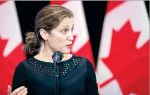  ?? CP PHOTO GEOFF ROBINS ?? Foreign Affairs Minister Chrystia Freeland speaks to the media as she arrives for the first day of a cabinet retreat in London, Ont. on Thursday.