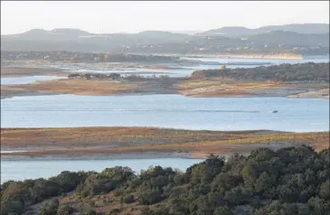  ??  ?? Lake Travis has collected less sediment than Lake Buchanan because it’s downstream and separated by a dam. Lake Travis has lost roughly 3 percent of its capacity to sedimentat­ion over 60 years.