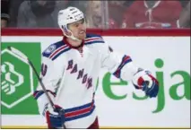  ?? PAUL CHIASSON — THE CANADIAN PRESS VIA AP ?? Rangers’ Michael Grabner celebrates an empty-net goal during the third period of 2-0 victory over Canadiens.