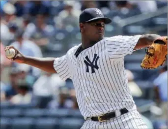  ?? THE ASSOCIATED PRESS ?? Yankees pitcher Luis Severino delivers against the Reds during the first inning of Wednesday’s game in New York.