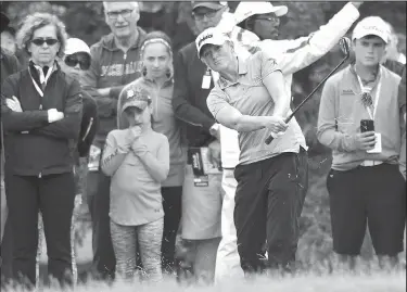  ?? Detroit News via AP/DALE G. YOUNG ?? Stacy Lewis watches her chip shot May 26 on the ninth hole at Travis Pointe Country Club during the LPGA Volvik Championsh­ip golf tournament in Ann Arbor, Mich.