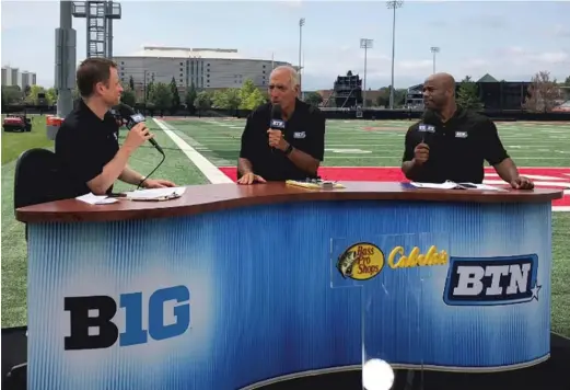  ?? BTN ?? The Big Ten Network, which features Dave Revsine (from left), Gerry DiNardo and Howard Griffith, says Comcast is the only provider threatenin­g to pull the plug.