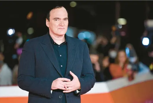  ?? ALBERTO PIZZOLI/GETTY-AFP 2021 ?? Filmmaker Quentin Tarantino has released his first work of nonfiction,“cinema Speculatio­n.”