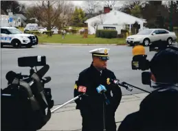  ?? JOSHUA A. BICKEL — THE COLUMBUS DISPATCH ?? Columbus Division of Police Sgt. James Fuqua addresses members of the media
Tuesday at the scene of an officer-involved shooting at the 1000 block of Oberlin Drive in Columbus, Ohio.