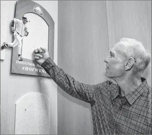  ?? MILO STEWART JR./NATIONAL BASEBALL HALL OF FAME AND MUSEUM VIA AP ?? In this photo provided by the National Baseball Hall of Fame and Museum, inductee Alan Trammell touches the spot where his plaque will be located as he tours the Plaque Gallery at the National Baseball Hall of Fame and Museum in Cooperstow­n, N.Y.,...