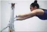  ?? ?? KATY: US gymnast Sunisa Lee participat­es in a workout at the USA Gymnastics Women’s Artistic and Rhythmic Gymnastics Media Day in Katy, Texas on February 5, 2024. — AFP