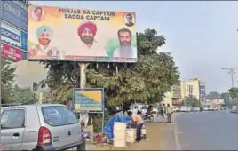  ??  ?? A hoarding with CM Amarinder Singh in the centre and Ludhiana MP Ravneet Singh Bittu and minister Bharat Bhushan Ashu on his side dotted key locations in Ludhiana on Sunday. GURPREET SINGH/HT