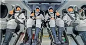  ?? AFP ?? This handout image shows NASA astronauts from left:Shannon Walker, Victor Glover, Mike Hopkins, and Japan Aerospace Exploratio­n Agency (JAXA) astronaut Soichi Noguchi, strapped in their seats inside the SpaceX Crew Dragon Resilience spacecraft. —