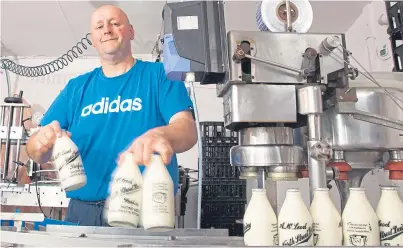  ?? Picture: Paul Reid. ?? Hamish Millar at work at North Street Dairy in Forfar.