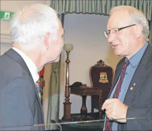  ?? HEATHER TAWEEL/THE GUARDIAN ?? Green Party Leader Peter Bevan-Baker, left, chats with Liberal Premier Wade MacLauchla­n before proceeding­s at the legislatur­e Thursday, where the premier tabled the white paper on electoral reform.