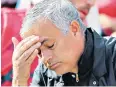  ??  ?? Hammered: Jose Mourinho cannot watch as his United side lose 3-1 to West Ham