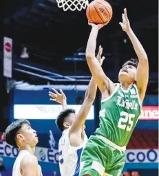  ?? (UAAP Media photo) ?? Charles Dimaano scores the go-ahead layup for De La SalleZobel against Ateneo.