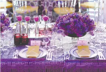  ?? A GREAT PARTY: DESIGNING THE PERFECT CELEBRATIO­N ?? Bryan Rafanelli designed seven state dinners for the Obamas, including one where White House tables were decorated with purple roses and lilacs.