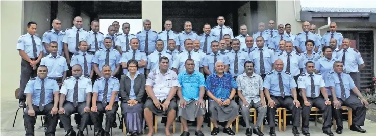  ?? Photo: National Fire Authority ?? National Fire Authority board chairperso­n John O’Connor (fifth from left), Prime Minister Voreqe Bainimaram­a (seventh from left), Minister for Local Government, Housing and Environmen­t and Infrastruc­ture and Transport Parveen Bala with firefighte­rs and staff members of NFA at Korovou Fire Station on December 22, 2017.