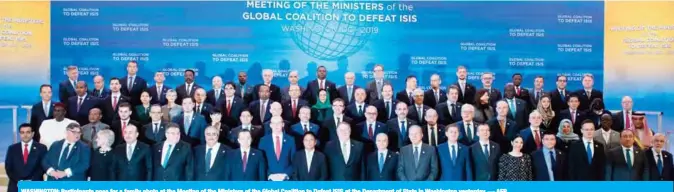  ??  ?? WASHINGTON: Participan­ts pose for a family photo at the Meeting of the Ministers of the Global Coalition to Defeat ISIS at the Department of State in Washington yesterday. — AFP