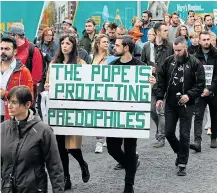  ??  ?? Stand4Trut­h protesters march through Dublin yesterday