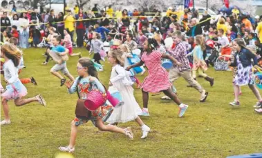  ?? STAFF FILE PHOTO ?? Children make a mad dash for eggs during the 2016 Easter at Coolidge event.