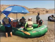  ?? JIM BUCHTA/MINNEAPOLI­S STAR TRIBUNE FILE PHOTOGRAPH ?? During an RV road trip to Moab, Utah, Jim Buchta and his family went rafting on the Colorado River.