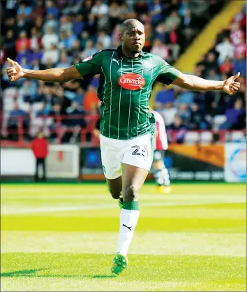  ??  ?? Paul-Arnold Garita (26) of Plymouth Argyle celebrates scoring a goal to give the visitors a 0-2