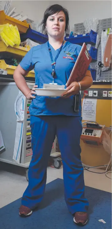  ?? Picture: MARC McCORMACK ?? FLAT OUT: ED nurse Adele Chazan on shift on Cairns Hospital's emergency department that kicked off the New Year with a record number of presentati­ons.