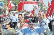  ?? PTI PHOTO ?? Left Democratic Mancha activists raise slogans against the razing of a Lenin statue, in Guwahati on Wednesday.