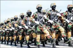  ?? HONG MENEA ?? Members of the elite Prime Minister’s Bodyguard Unit march in a parade celebratin­g the group’s anniversar­y in 2016 in Kandal province.