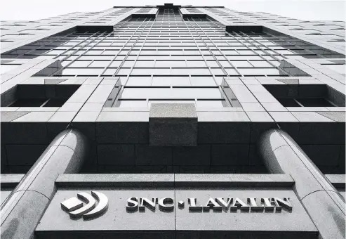  ?? PAUL CHIASSON / THE CANADIAN PRESS FILES ?? Engineerin­g and constructi­on giant Snc-lavalin is facing criminal prosecutio­n over alleged bribes to Libyan government officials under the regime of Moammar Gadhafi while pursuing business in that country.