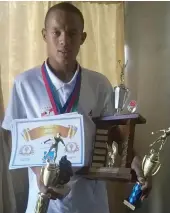  ??  ?? Roy-Keane Avontuur, 14, with some of his awards.