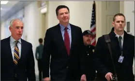  ?? AP Photo/Manuel Balce Ceneta ?? Comey: Former FBI Director James Comey, with his attorney, David Kelley, left, arrive to testify under subpoena behind closed doors before the House Judiciary and Oversight Committee on Capitol Hill in Washington on Friday.