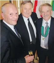  ??  ?? Italian Consul General Massimilia­no Iacchini congratula­ted Luigi Aquilini and Lucio Sacchetti on his country conferring different knightly honours on them.